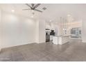 Open concept kitchen with island and stainless steel appliances at 6850 E Mcdowell Rd # 26, Scottsdale, AZ 85257