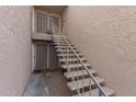 Exterior condo staircase leading to upper level units at 1920 W Lindner Ave # 147, Mesa, AZ 85202