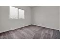 Spacious bedroom featuring neutral wall paint and carpet at 2518 N Pony Ln, Casa Grande, AZ 85122