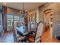Elegant dining room features a rustic table and ornate chairs at 5681 E Canyon Ridge North Dr, Cave Creek, AZ 85331