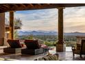Covered patio with amazing mountain views and comfortable seating at 10040 E Happy Valley Rd # 512, Scottsdale, AZ 85255