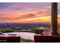 Infinity pool and patio with breathtaking sunset views at 10040 E Happy Valley Rd # 512, Scottsdale, AZ 85255