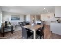 Light and bright dining area with wood-look flooring at 1360 W Inca Dr, Coolidge, AZ 85128