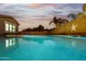 Stunning pool with a clear view of the home's exterior at 18373 W Sells Dr, Goodyear, AZ 85395