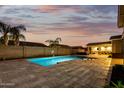Inviting rectangular pool and spa in a private backyard at 18373 W Sells Dr, Goodyear, AZ 85395