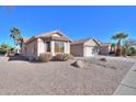 House exterior showcasing a side view and desert landscaping at 2394 E Fiesta Dr, Casa Grande, AZ 85194
