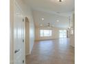 Open living room with tile floors and high ceilings at 2394 E Fiesta Dr, Casa Grande, AZ 85194