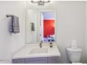 Modern bathroom with gray vanity and white countertop at 4444 N 25Th St # 15, Phoenix, AZ 85016
