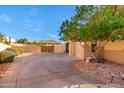 Spacious driveway and gated entry to the property at 4055 N Recker Rd # 85, Mesa, AZ 85215