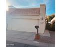 Front view of the house with a two-car garage at 771 E Pepper Dr, Casa Grande, AZ 85122