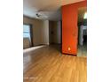 Open concept living area with wood-look floors at 771 E Pepper Dr, Casa Grande, AZ 85122