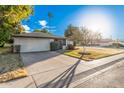 Single story home with landscaped yard and two car garage at 575 Leisure World --, Mesa, AZ 85206