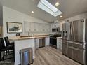 Modern kitchen with stainless steel appliances and ample cabinetry at 650 N Hawes Rd # 4634, Mesa, AZ 85207