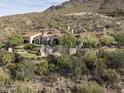 Luxury estate home nestled in the mountains with stunning landscaping at 11068 E Canyon Cross Way, Scottsdale, AZ 85255