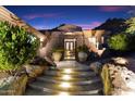 Stunning curb appeal with a gated entry and mountain views at 11132 E Juan Tabo Rd, Scottsdale, AZ 85255