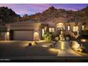 Desert home with 3-car garage and manicured landscaping at 11132 E Juan Tabo Rd, Scottsdale, AZ 85255