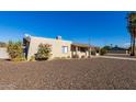 Side view of a ranch home with rock landscaping at 3644 E Kings Ave, Phoenix, AZ 85032