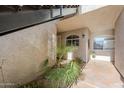 private patio access with stone tile at 7777 E 2Nd St # 111, Scottsdale, AZ 85251