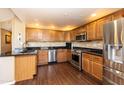 Modern kitchen with granite countertops and stainless steel appliances at 33550 N Dove Lakes Dr # 2026, Cave Creek, AZ 85331