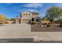Two-story house with beige exterior, three-car garage, and landscaped front yard at 3829 S Harlan --, Mesa, AZ 85212