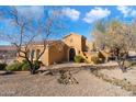 Stunning desert home with gated entry and mature landscaping at 10432 E Winter Sun Dr, Scottsdale, AZ 85262