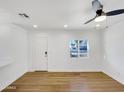 Light-filled living room with hardwood floors and a window at 1101 N 13Th St, Phoenix, AZ 85006