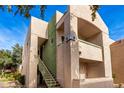 Another view of the building's exterior, showing the entrance and landscaping at 1295 N Ash St # 625, Gilbert, AZ 85233