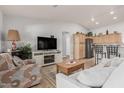 Living room features a fireplace and an open floor plan at 5736 E Lawndale St, Mesa, AZ 85215