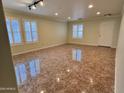Large living area featuring tiled floors and recessed lighting at 881 E Appaloosa Rd, Gilbert, AZ 85296