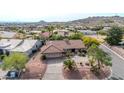 Aerial view of single-story home with desert landscaping and mountain views at 15205 E Palomino Blvd, Fountain Hills, AZ 85268