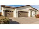 Single-story home with two-car garage and landscaped front yard at 3908 S 78Th Ln, Phoenix, AZ 85043