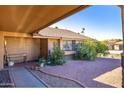 Home entrance with walkway, landscaping, and covered entryway at 3953 W Evans Dr, Phoenix, AZ 85053