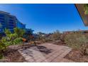 Spacious patio with city views and lush landscaping at 7127 E Rancho Vista Dr # 6003, Scottsdale, AZ 85251