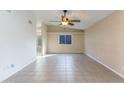 Spacious living area with tile flooring and natural light at 6819 E Grandview Dr, Scottsdale, AZ 85254