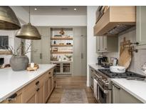 Modern kitchen with large island and cabinetry at 3149 S Prospector Cir, Gold Canyon, AZ 85118