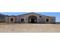Stunning one-story home with a tile roof and desert landscaping at 0 N Bell Rd # 4, Queen Creek, AZ 85144
