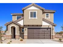 Two-story home with a two-car garage, attractive exterior and landscaping at 10746 E Dragoon Cir, Mesa, AZ 85208