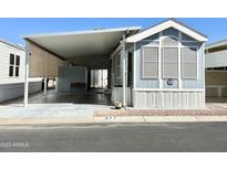 Mobile home with carport and covered patio at 377 S Gypsum Dr, Apache Junction, AZ 85119