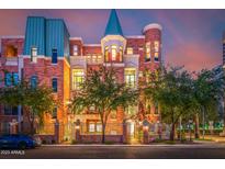 Brick building with a unique architectural style and street view at 2001 N 1St Ave, Phoenix, AZ 85003