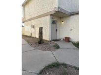Exterior view of building with walkway and landscaping at 3840 N 43 Ave # 50, Phoenix, AZ 85031