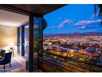 Stunning nighttime cityscape and mountain views from balcony at 7180 E Kierland Blvd # 1115, Scottsdale, AZ 85254