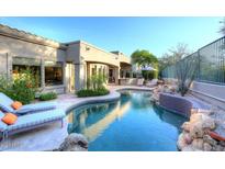 Private pool with spacious patio and lounge chairs at 22448 N 77Th Way, Scottsdale, AZ 85255