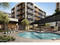 Modern apartment community with resort-style pool and lounge area at 19355 N 73Rd Way # 3024, Scottsdale, AZ 85255