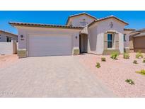 Single-story home with two-car garage and landscaping at 20240 W Catalina Dr, Buckeye, AZ 85396