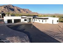 Aerial view of a modern home with mountain views at 3525 S Kings Ranch Ct # 4, Gold Canyon, AZ 85118