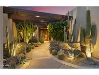 Elegant entryway with a stone pathway and cacti at 10801 E Happy Valley Rd # 108, Scottsdale, AZ 85255