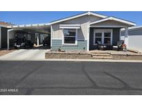 Charming manufactured home with carport and front patio at 650 N Hawes Rd # 2737, Mesa, AZ 85207