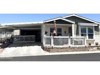 Mobile home with covered carport and patio at 650 N Hawes Rd # 3530, Mesa, AZ 85207