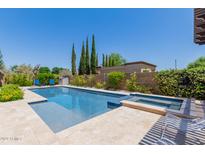Inviting backyard oasis with a sparkling pool and spa at 3314 E Azalea Dr, Gilbert, AZ 85298
