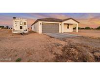 Single-story home with attached garage and RV parking at 3515 N Tewa Cir, Eloy, AZ 85131